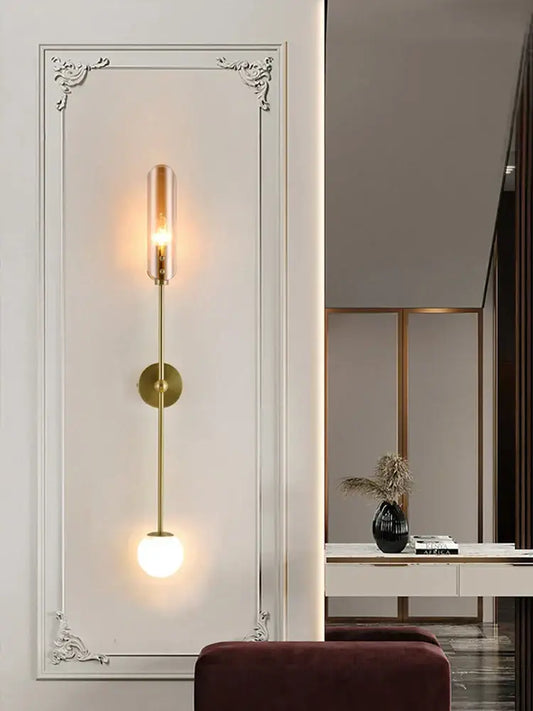 Modern gold metal wall light bedroom sconce with decorbites gold metal finish and frosted globe shade