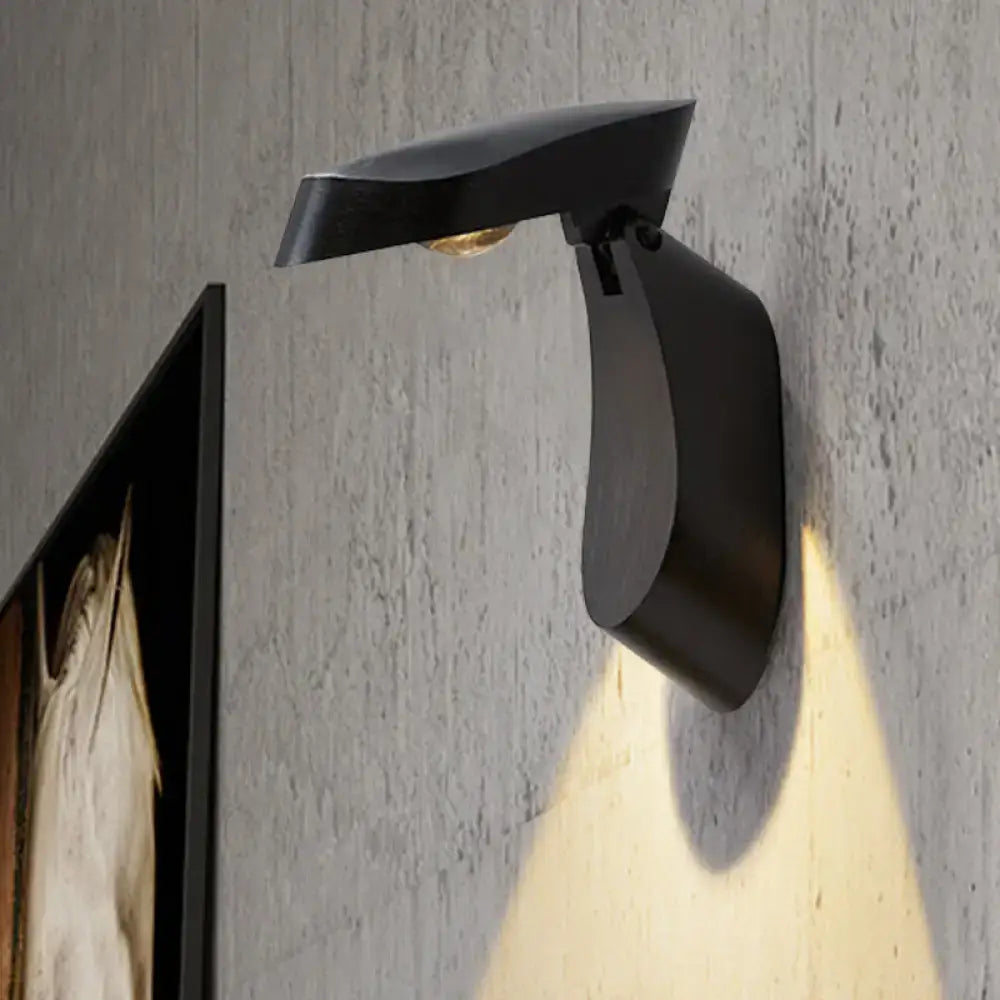 Black matte wall light metal fixture with modern design for bedroom bedside illumination