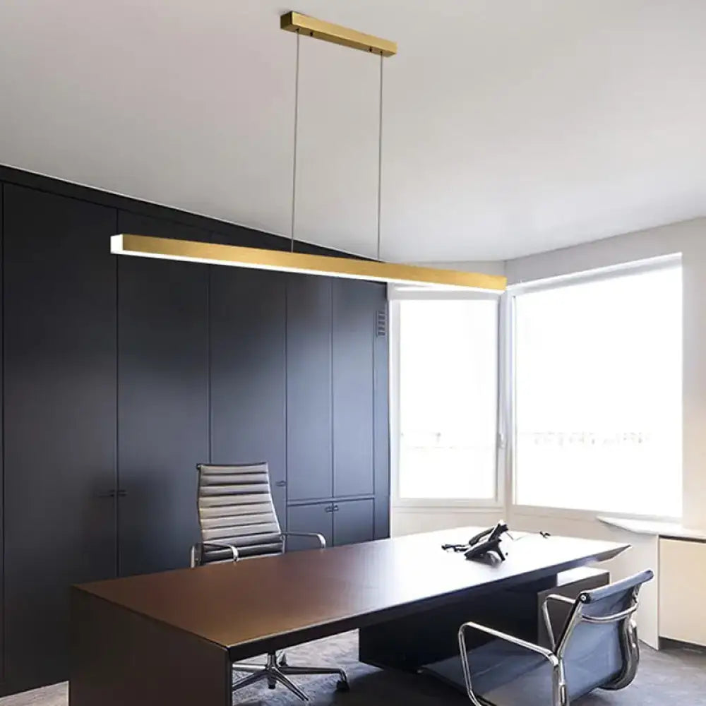 Modern gold minimalist led suspension lamp light fixture with gold-finished metal rectangular design above conference table
