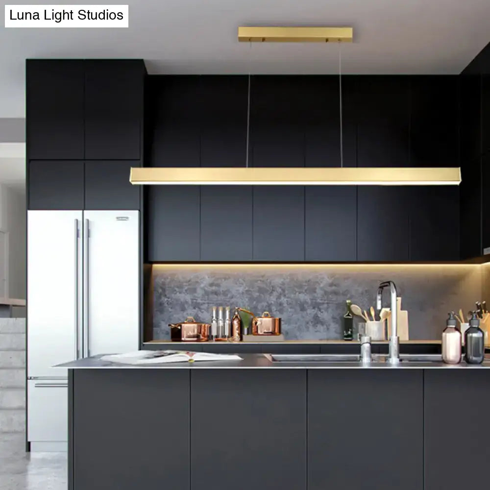 Modern gold minimalist led suspension lamp metal light fixture hanging above kitchen island