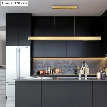 Modern gold minimalist led suspension lamp metal light fixture hanging above kitchen island