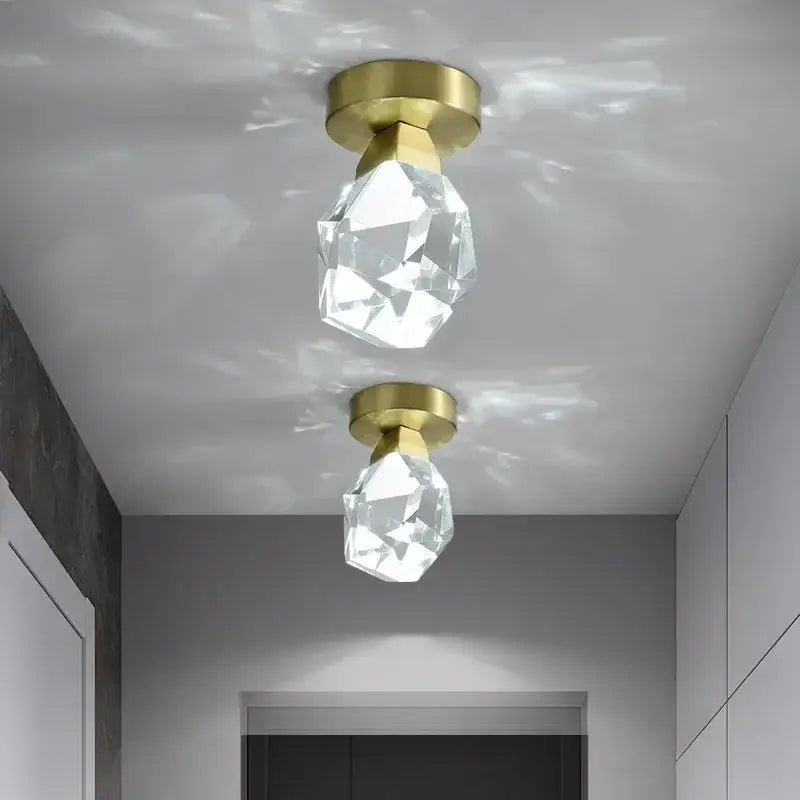 Two modern gold minimalist led wall lamps with faceted clear crystal globes for living room decorbites gold minimalist