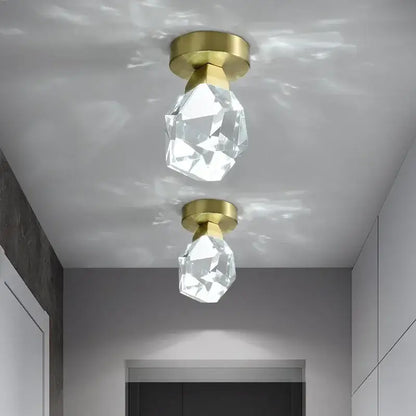 Two modern gold minimalist led wall lamps with faceted clear crystal globes for living room decorbites gold minimalist