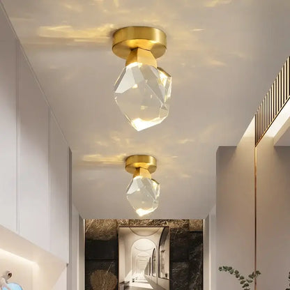 Modern gold minimalist led wall lamp featuring a gold-finished ceiling light with a faceted crystal glass globe for living room decorbites gold minimalist