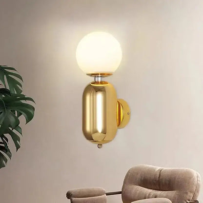 Modern gold mirror ball wall lamp with frosted glass globe sconce for elegant bedroom decorbites wall lamp lighting