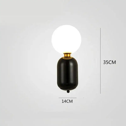 Black cylindrical wall lamp with frosted glass globe and gold-toned accents for modern decorbites gold mirror ball wall lamp