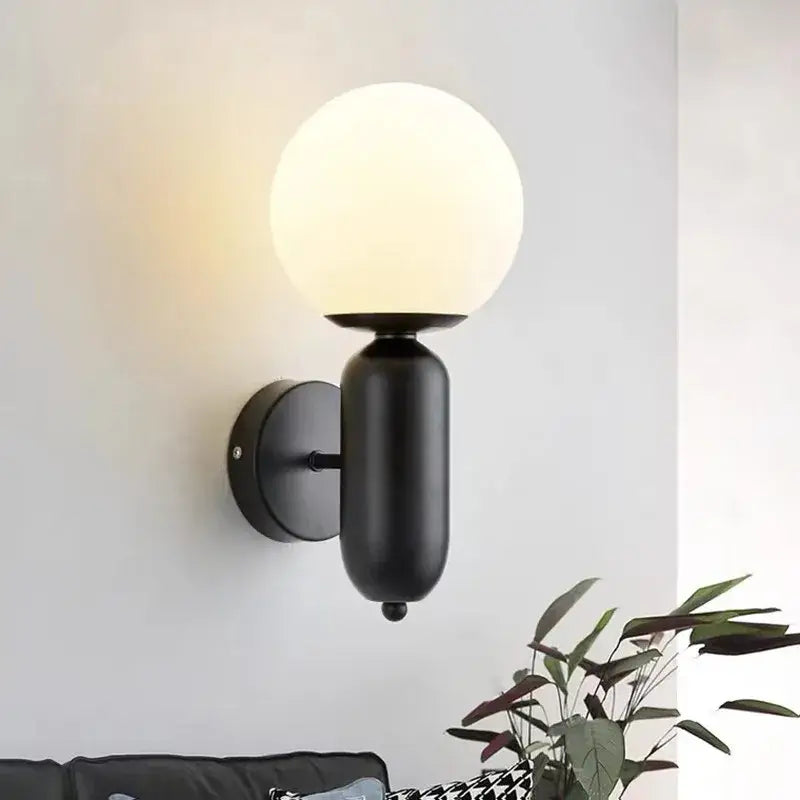Black matte wall lamp with frosted glass globe shade for modern decorbites gold mirror ball wall lamp bedroom use