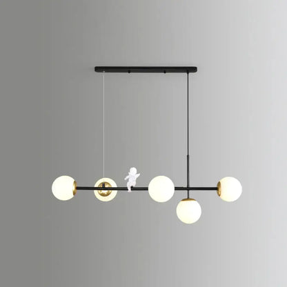 DecorBites™ Modo Island 5-light pendant light in gold black with milk white frosted glass globes for restaurants