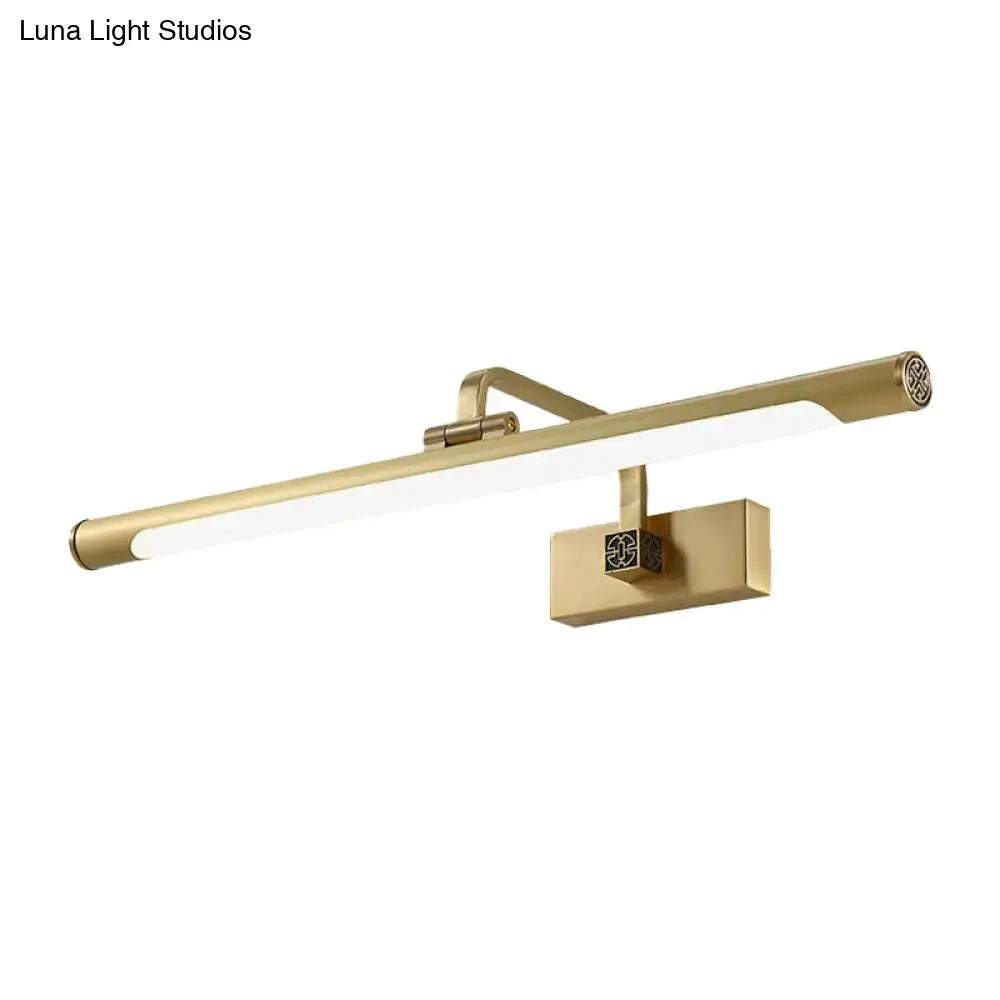 Brass-finished modern wall-mounted light fixture with acrylic shade and geometric accents, ideal for bedroom decor