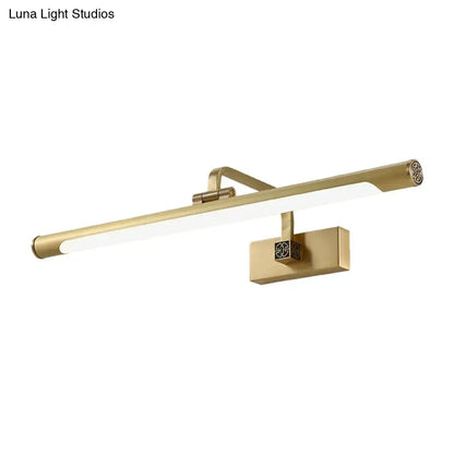 Brass-finished modern wall-mounted light fixture with acrylic shade and geometric accents, ideal for bedroom decor