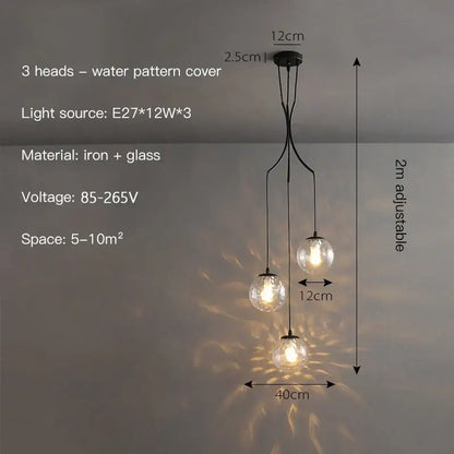 Modern gold nordic pendant light with black iron and glass spherical bulbs casting water patterns for dining room decorbites gold nordic