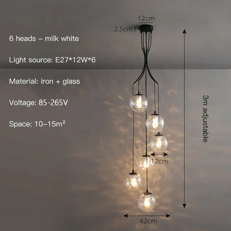 Modern gold nordic pendant light featuring six milk white glass globes on black iron frame for dining room decorbites gold nordic