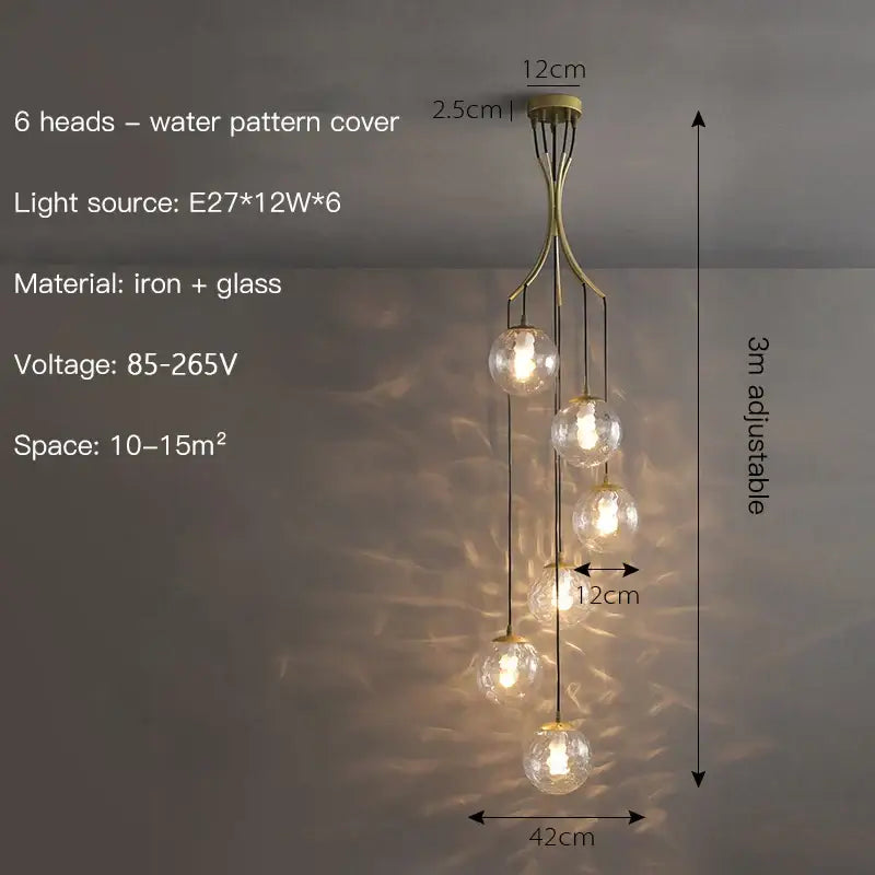 Modern gold nordic pendant light with six spherical glass bulbs and brass-toned water-patterned cover for dining room decorbites gold nordic