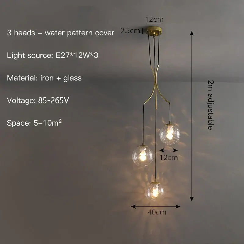 Modern gold nordic pendant light with brass-toned iron frame and glass spherical bulbs for dining room decorbites gold nordic