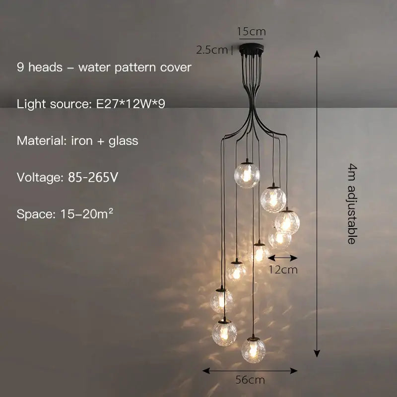 Modern gold nordic pendant light featuring a black iron and glass cascading chandelier with nine spherical bulbs for dining room decorbites gold nordic