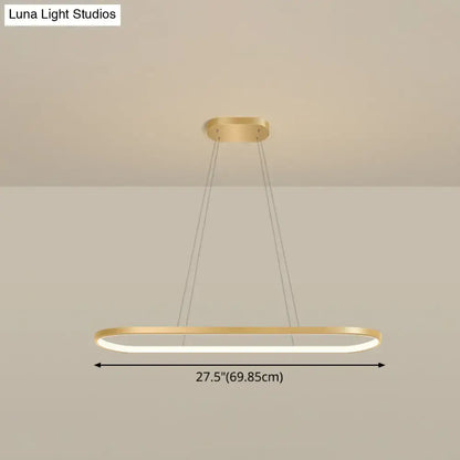 Modern gold oblong pendant light fixture with integrated led warm white color and adjustable chain cord length for dining room