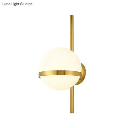 Modern gold opal glass orb wall sconce with gold finish frosted opal glass and horizontal accent band for living room light