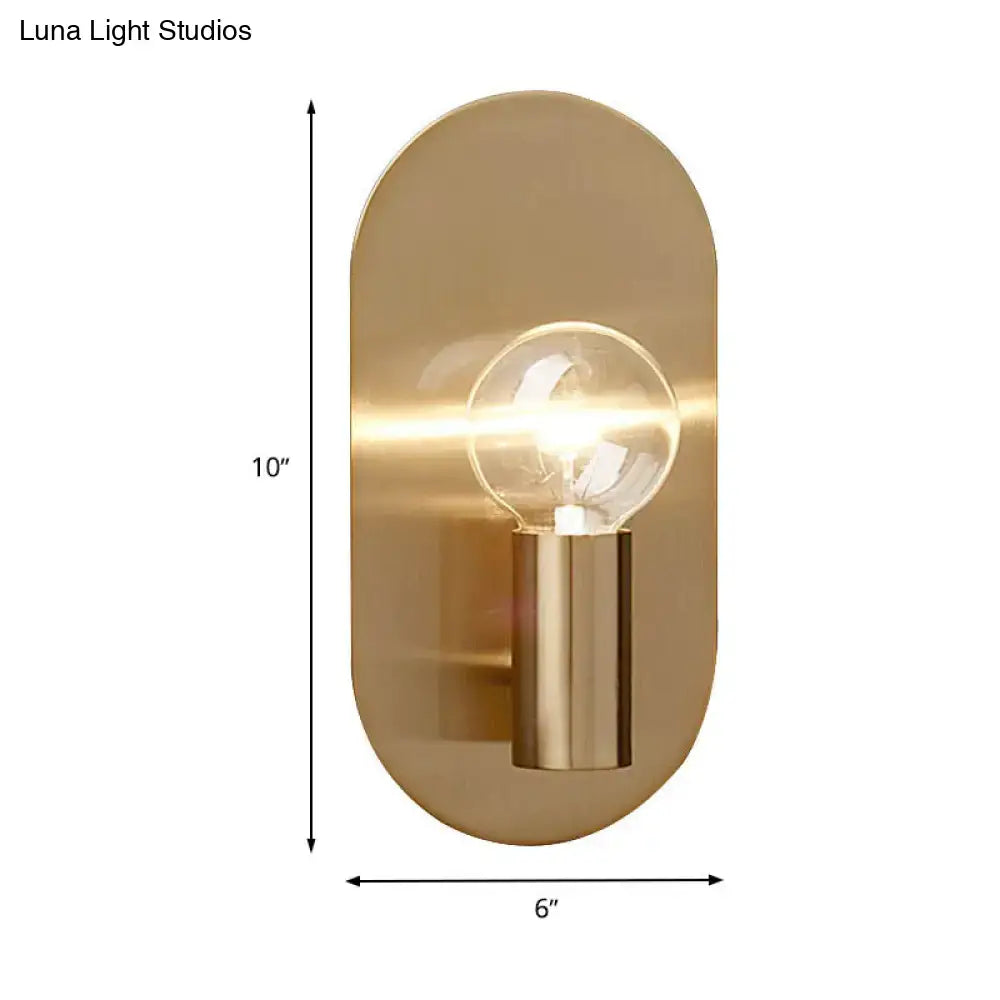 Modern gold oval sconce bedroom light featuring a sleek brushed brass bare bulb metal shade with clear glass bulb