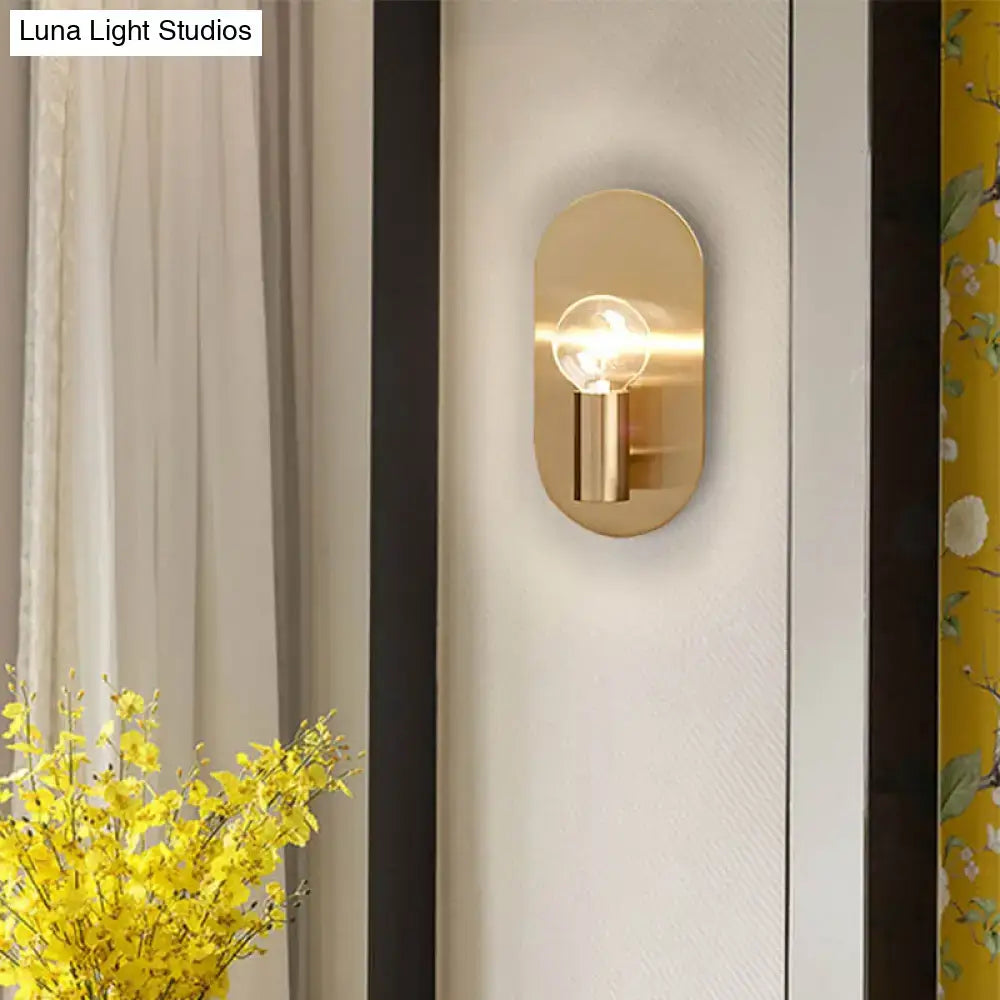 Modern gold oval sconce bedroom light with bare bulb metal shade featuring a sleek minimalist design and exposed filament bulb