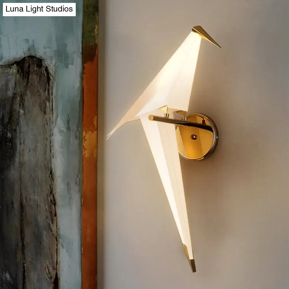 Modern gold paper crane wall lamp with birdie plastic shade and translucent white wings for dining room sconce use