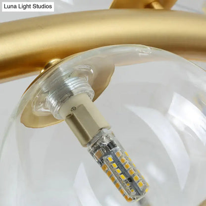 Gold-finished led bulb with visible yellowish leds in decorbites™ nordic style pendant light with clear cognac glass
