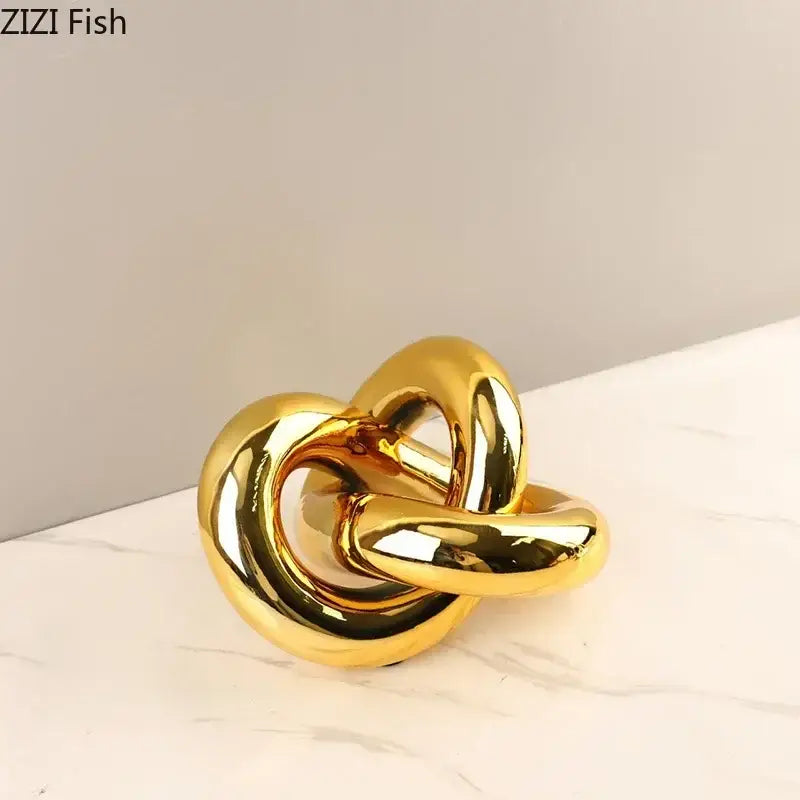 Modern gold-plated knot ornaments shiny gold metallic knot-shaped decorbites gold-plated knot sculpture for living room