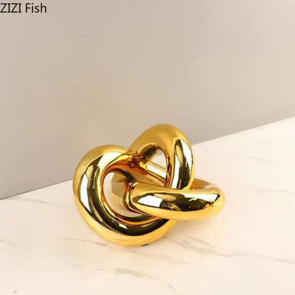Modern gold-plated knot ornaments shiny gold metallic knot-shaped decorbites gold-plated knot sculpture for living room
