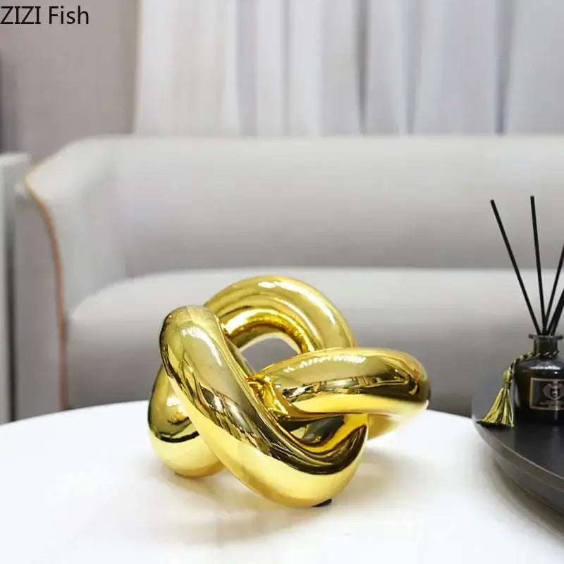 Shiny gold-plated knot ornaments decorbites geometric sculpture for modern living room decor