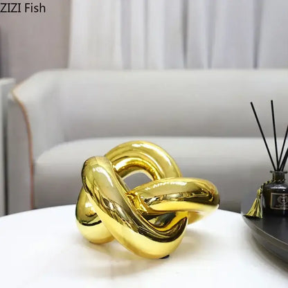 Shiny gold-plated knot ornaments decorbites geometric sculpture for modern living room decor