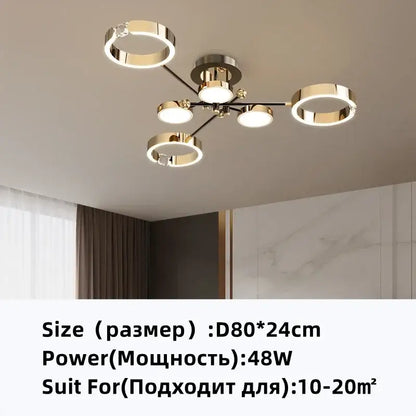 Modern gold plated luxury chandelier with five circular rings and central hub for elegant living room decorbites gold plated design
