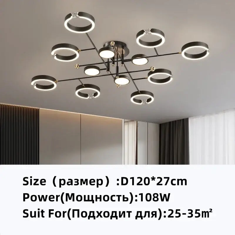 Modern black and gold plated luxury chandelier featuring glowing LED rings for elegant living room decorbites lighting