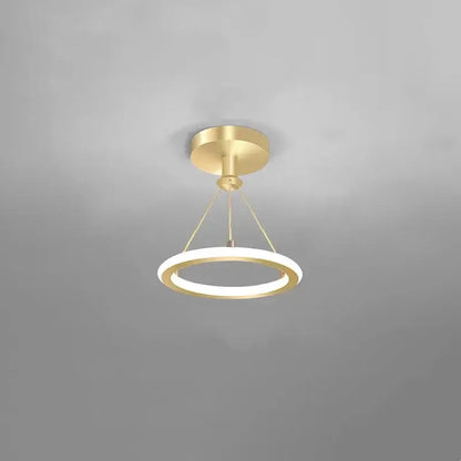 Modern gold plated luxury chandelier with a circular glowing white ring and minimalist design for living room decorbites gold plated