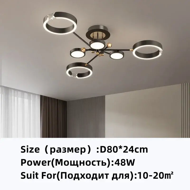 Modern black and gold plated luxury chandelier with illuminated circular rings for elegant living room decorbites lighting