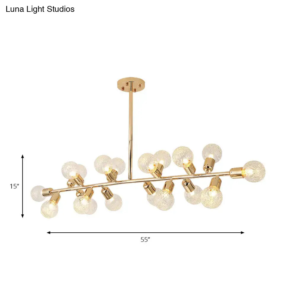 Gold-toned DecorBites™ prismatic glass ceiling light with multiple frosted glass bulbs on a sleek metal bar ideal for hotels