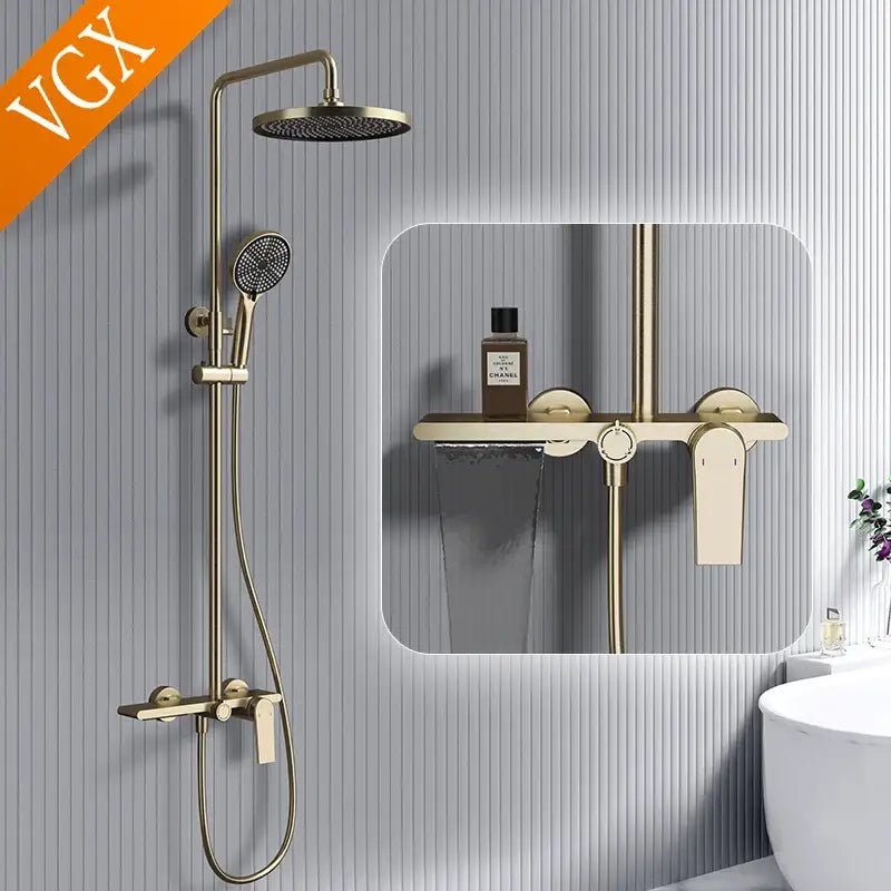 Modern gold rainfall shower set with brass finish featuring round rainhead and hand shower for bathroom shower use