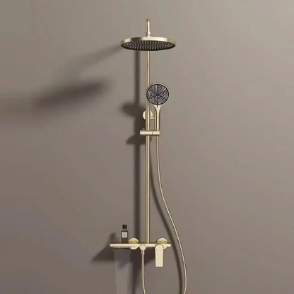 Modern gold rainfall shower set with brass finish featuring a round rainhead and handheld nozzle bathroom shower