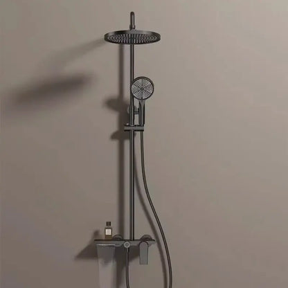 Modern matte black shower set with round rainhead and hand shower for a bathroom shower with gold accents
