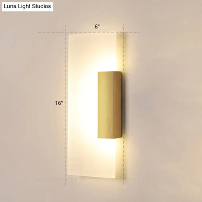 Modern gold rectangular acrylic wall sconce with frosted glass diffuser and brushed brass accent bulb included