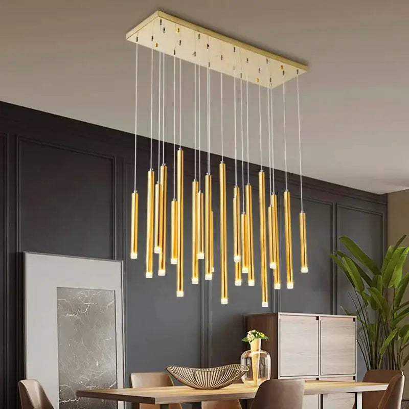 Modern gold rectangular chandelier with cylindrical pendant lights suspended by cords for dining room decorbites elegant chandelier