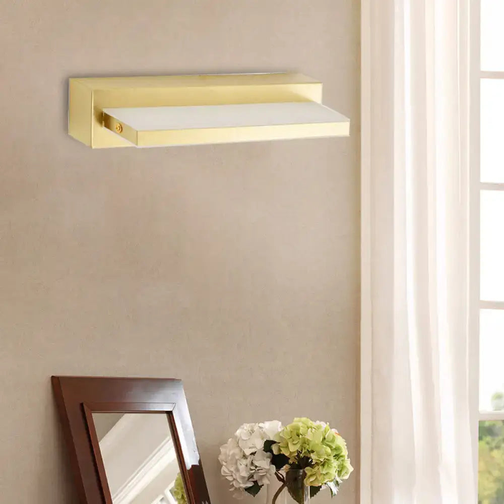 Modern gold rectangular led wall sconce with a frosted acrylic shade for bedroom lighting