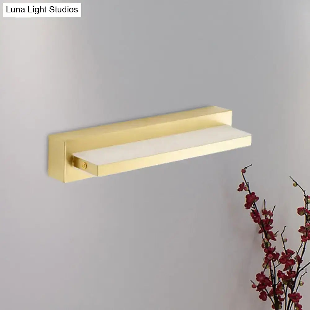 Modern gold rectangular led wall sconce with acrylic shade and frosted glass diffuser for bedroom lighting