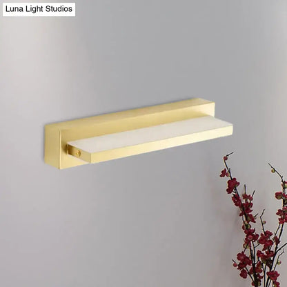 Modern gold rectangular led wall sconce with acrylic shade and frosted glass diffuser for bedroom lighting