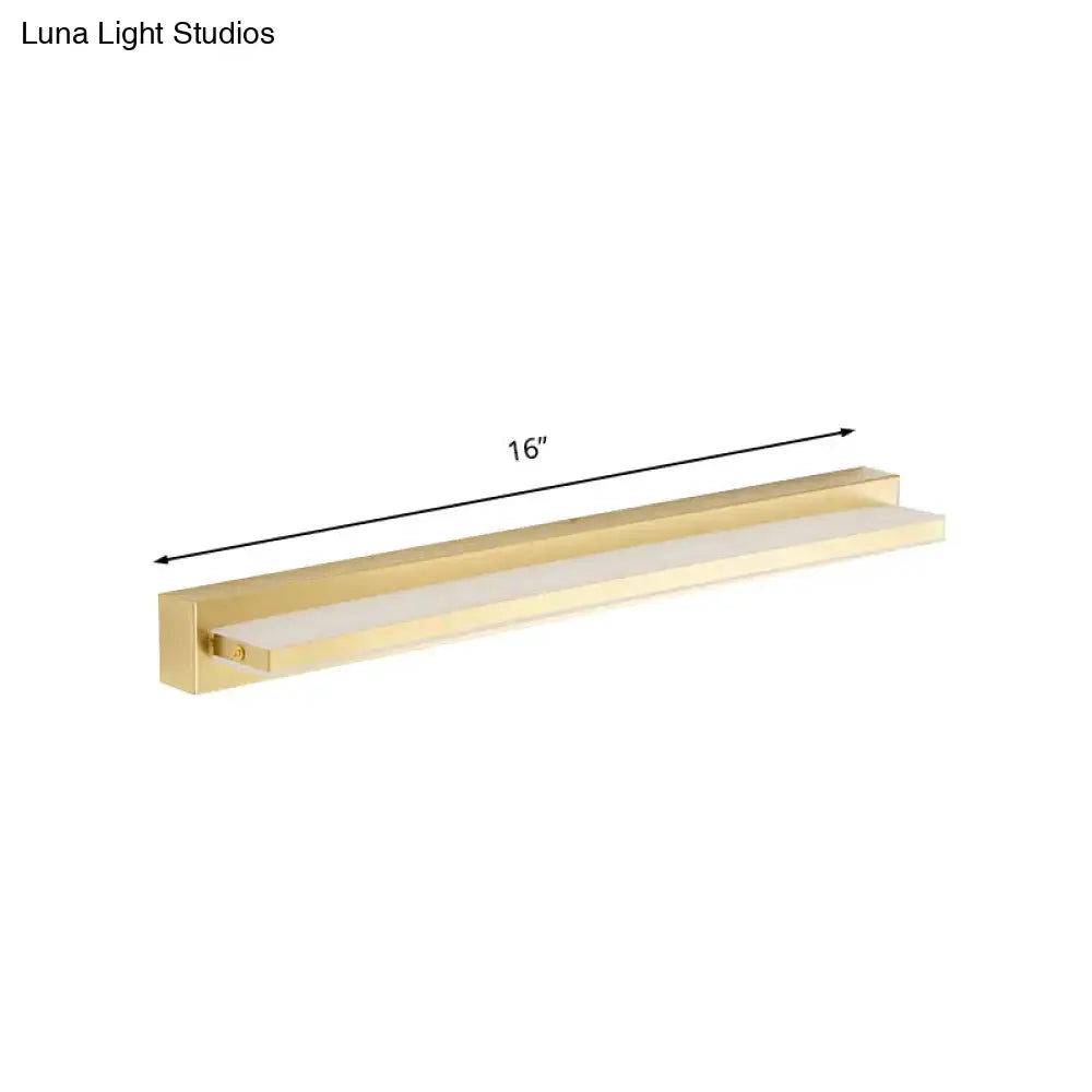 A sleek 16-inch gold modern rectangular led wall sconce with acrylic shade and integrated light panel for bedroom use