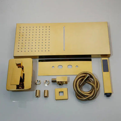 Modern gold rectangular shower mixer set with rain showerhead handheld sprayer and wall mounted valve fixtures