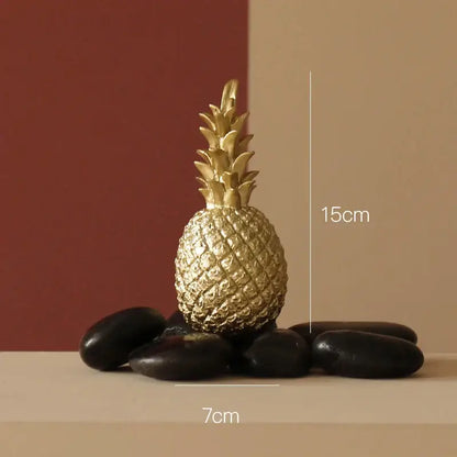 Modern gold resin sculpture living room abstract figurine featuring a gold resin sculpture textured pineapple decorbites gold resin