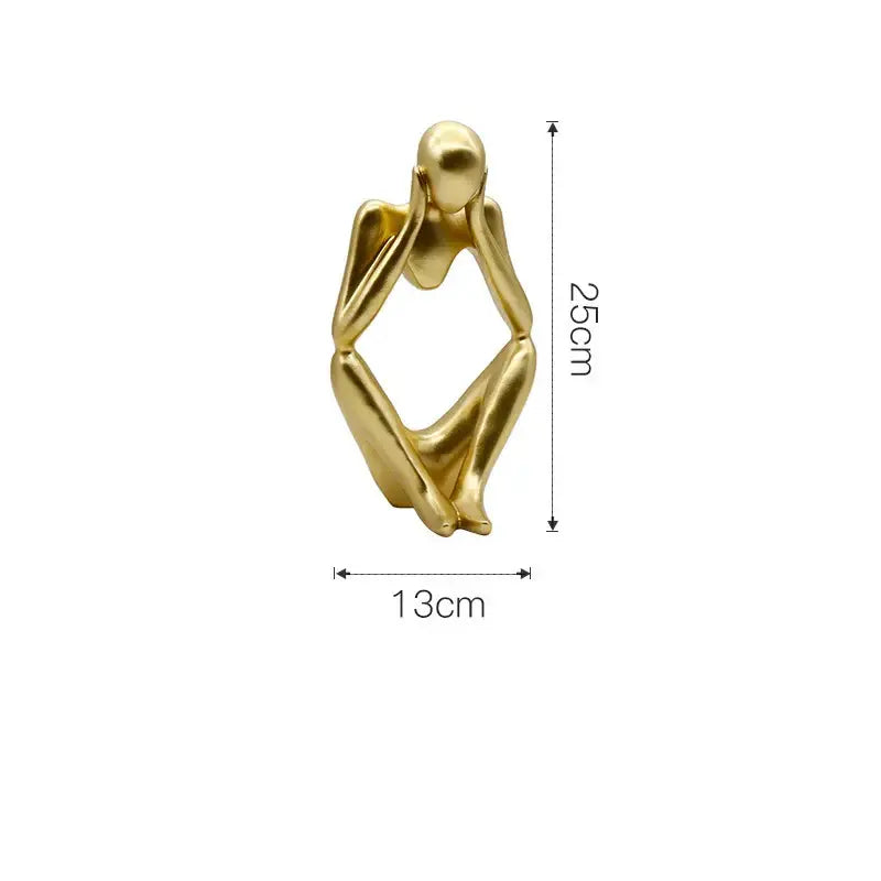 Modern gold resin sculpture living room abstract figurine of a gold resin seated human in contemplative pose by decorbites gold
