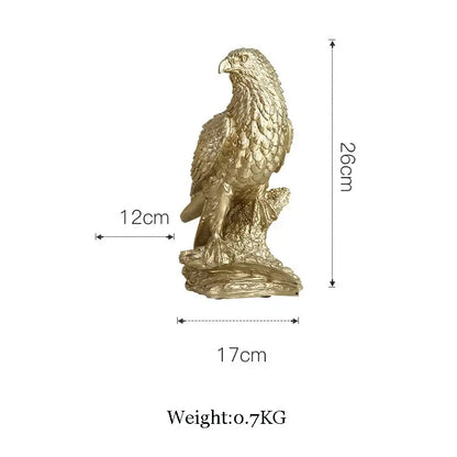 Modern gold resin sculpture of a golden eagle figurine with detailed feather texture on a rocky base by decorbites gold resin