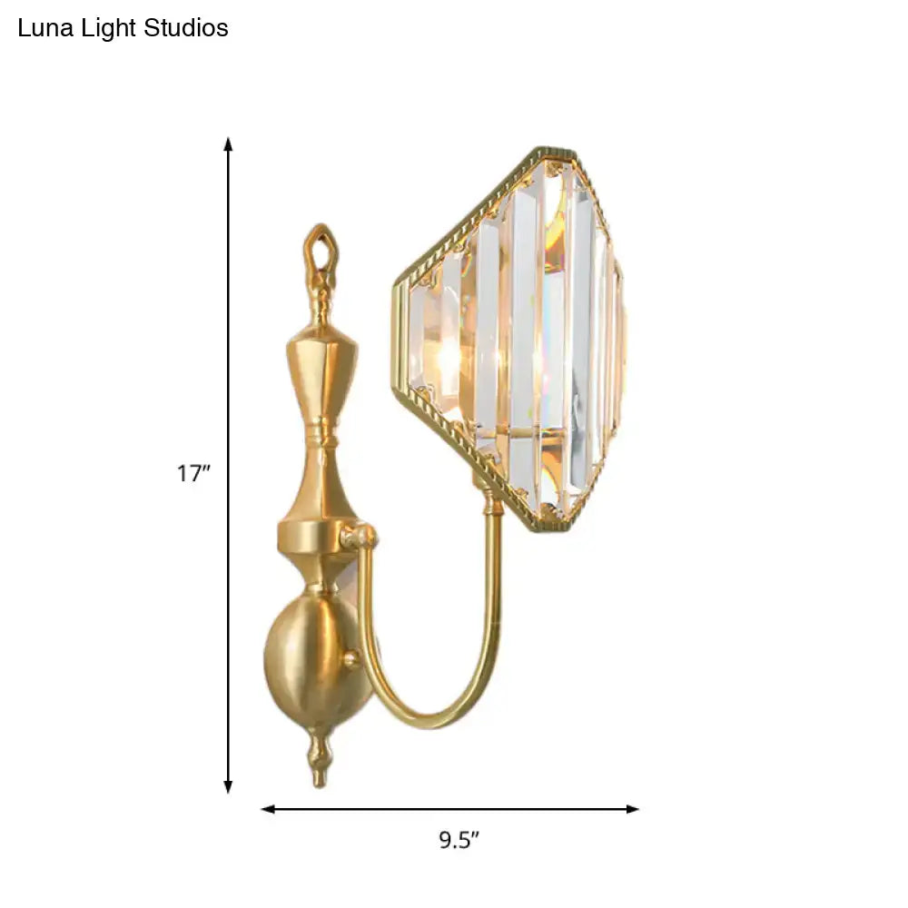 Modern gold wall lamp with brass arm and hexagonal crystal prism wall mount for elegant bedroom lighting