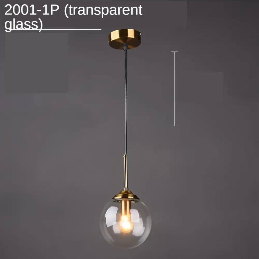 Modern gold ring pendant light with glass globe and matching ceiling mount for dining room illumination