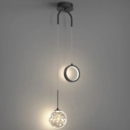 Modern gold ring led pendant light with black metal circular ring and crystal globe illuminated by warm leds for decorbites gold ring decor